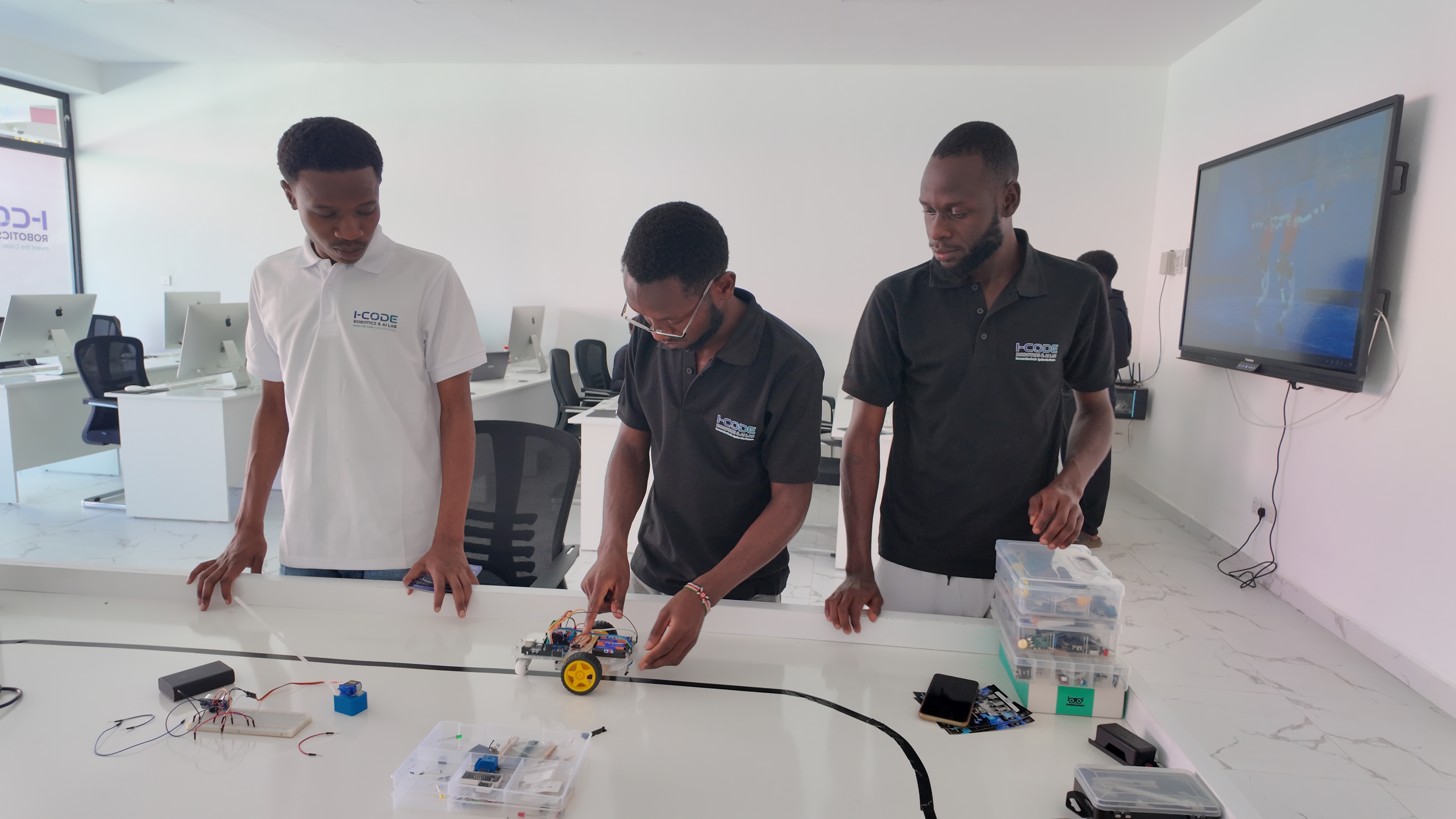 i-CODE team tests line-following robot on lab track