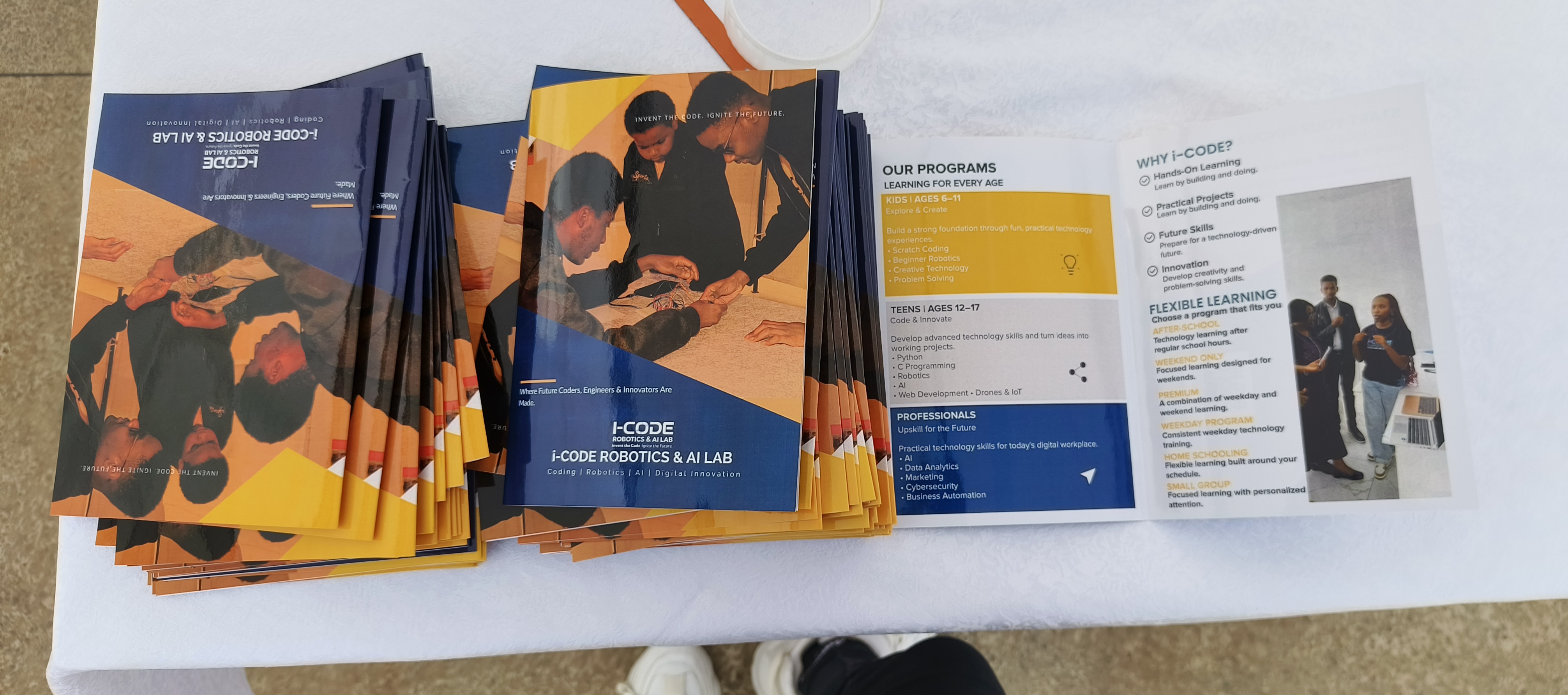 i-CODE programme brochures ready at outreach event