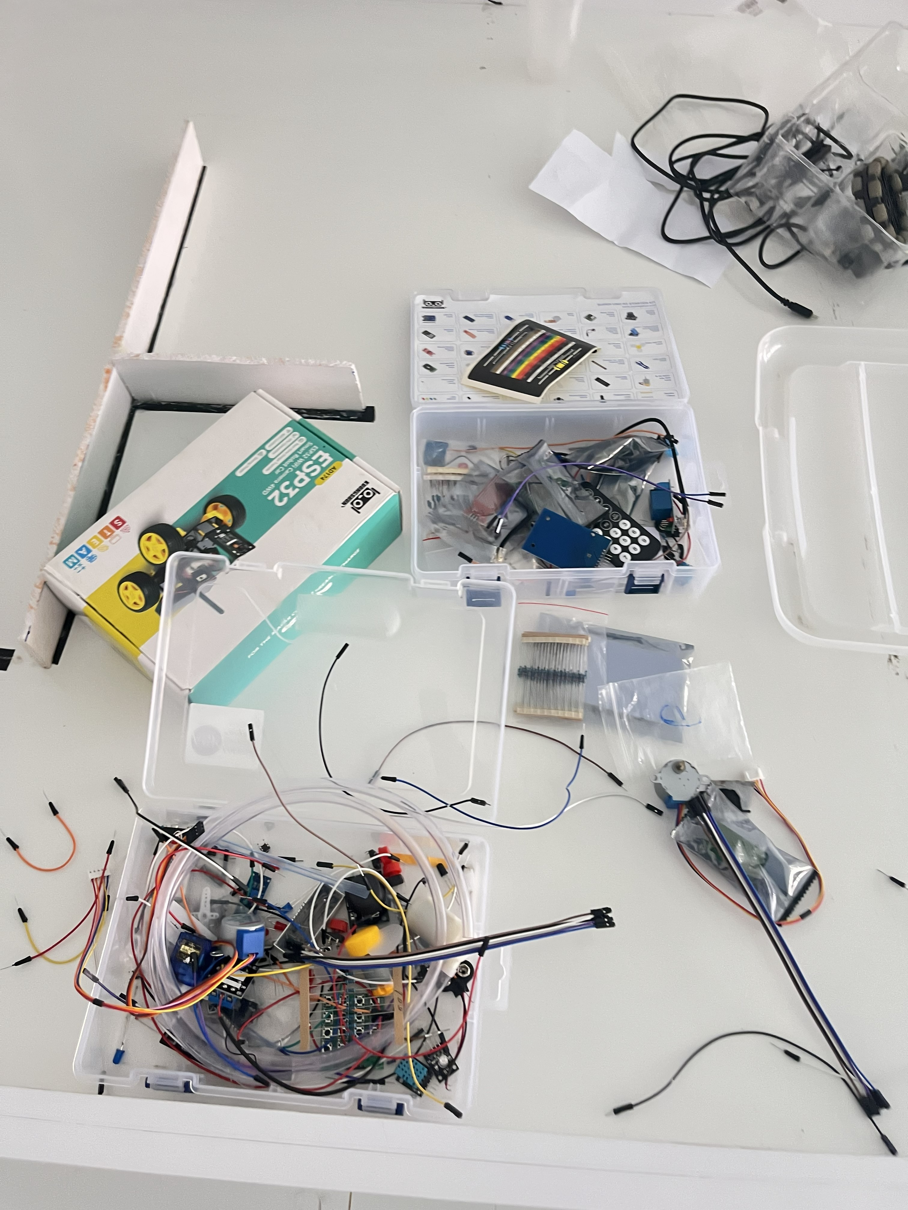 i-CODE electronics component kits spread across the lab table